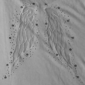 Sweater with open wings on the back by Interdee
